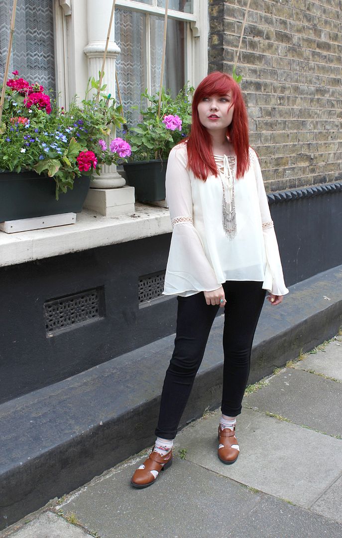 paige joanna apricote clothing top and black jeans